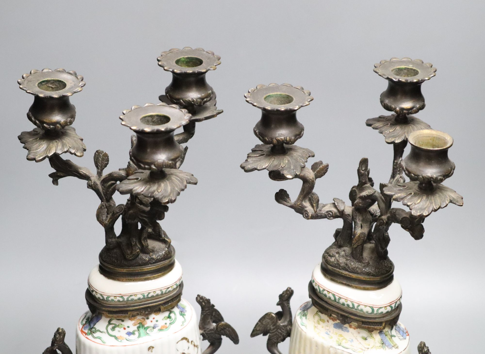 A pair of Chinese famille verte vases converted to candelabra, height 41cm